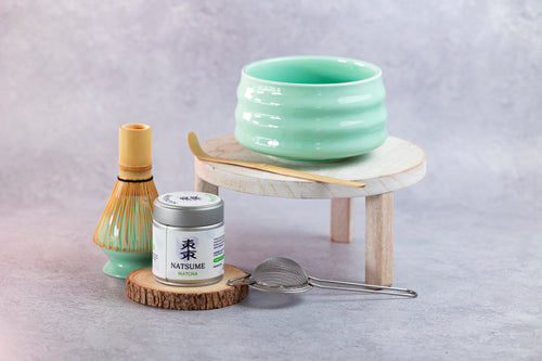 Matcha Tea-making set with a green ceramic bowl, matcha whisk, scoop, sifter, and Natsume Matcha