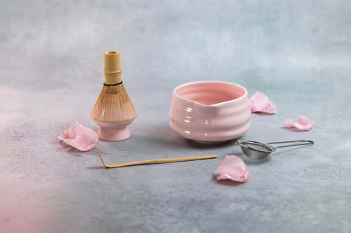 Matcha Tea-making set with a green ceramic bowl, matcha whisk, scoop, sifter, and Natsume Matcha